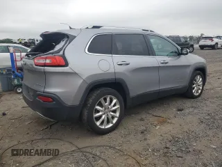 2014 Jeep Cherokee Limited with VIN 1C4PJLDS0EW241327, listed as a Copart auction lot 59440245 with 73,623 mi miles and Salvage title. Bid and sale history available at DreamBid. Image 3.