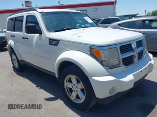 2007 Dodge Nitro SXT z VIN 1D8GU28K97W664259, wystawiony jako IAAI lot #42305729 z przebiegiem 226 574 mil mil oraz . Historia ofert i sprzedaży dostępna na DreamBid. Obrazek 1.
