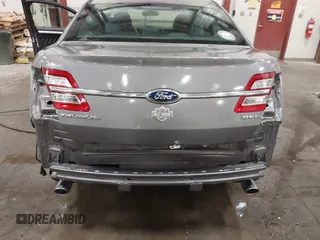 2013 Ford Taurus SEL with VIN 1FAHP2E86DG177504, listed as a IAAI auction lot 42071852 with 130,547 mi miles and . Bid and sale history available at carsss.com. Image 12.