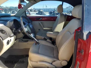 2010 Volkswagen Beetle with VIN 3VWRG3AL1AM005636, listed as a Copart auction lot 44068415 with 57,056 mi miles and Salvage Title. Bid and sale history available at DreamBid. Image 7.