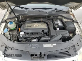 2009 Volkswagen Passat z VIN WVWJK93C49P054575, wystawiony jako Copart lot #57880855 z przebiegiem 148 327 mil mil oraz Szkody całkowita. Historia ofert i sprzedaży dostępna na DreamBid. Obrazek 11.