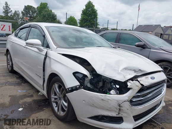 2016 Ford Fusion Titanium Hybrid with VIN 3FA6P0RU3GR190355, listed as a IAAI auction lot 42384309 with 157,172 mi miles and . Bid and sale history available at DreamBid. Image 1.
