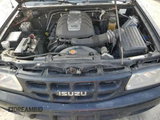 2001 Isuzu Rodeo S with VIN 4S2CK58W214338866, listed as a Copart auction lot 85280494 with 57,279 mi miles and Clean title. Bid and sale history available at DreamBid. Image 12.