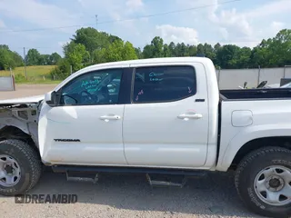 2017 Toyota Tacoma SR5 with VIN 3TMCZ5AN1HM063580, listed as a IAAI auction lot 42421660 with 95,543 mi miles and . Bid and sale history available at DreamBid. Image 15.