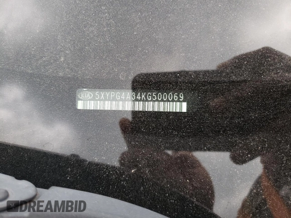 2019 Kia Sorento L z VIN 5XYPG4A34KG500069, wystawiony jako Copart lot #52714105 z przebiegiem 237 472 mil mil oraz Szkoda całkowita • Salvage title. Historia ofert i sprzedaży dostępna na DreamBid. Obrazek 13.