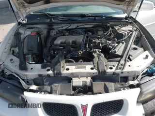 2003 Pontiac Grand Prix SE z VIN 1G2WK52J93F126127, wystawiony jako IAAI lot #42078346 z przebiegiem 236 183 mil mil oraz . Historia ofert i sprzedaży dostępna na DreamBid. Obrazek 10.