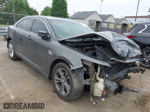 2015 Ford Taurus SEL z VIN 1FAHP2E81FG163058, wystawiony jako IAAI lot #42279778 z przebiegiem 127 957 mil mil oraz . Historia ofert i sprzedaży dostępna na DreamBid. Obrazek 1.