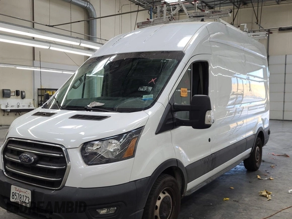 2020 Ford Transit Cargo z VIN 1FTBR1XG3LKB79165, wystawiony jako IAAI lot #42763042 z przebiegiem 140 992 mil mil oraz . Historia ofert i sprzedaży dostępna na DreamBid. Obrazek 7.