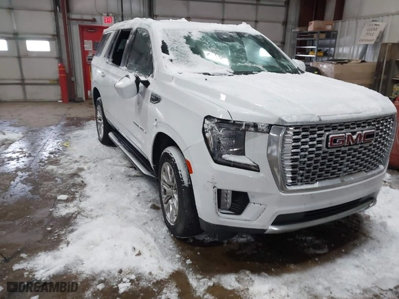 2023 GMC Yukon Denali with VIN 1GKS2DKL5PR266660, listed as a IAAI auction lot 41618299 with 53,440 mi miles. Bid and sale history available at carsss.com. Image 1.