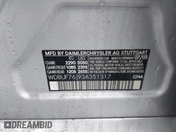 2003 Mercedes-Benz E-Class 5.5L AMG with VIN WDBUF76J93A351317, listed as a IAAI auction lot 41573446 with 144,119 mi miles. Bid and sale history available at carsss.com. Image 9.