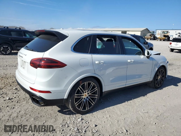 2015 Porsche Cayenne Turbo z VIN WP1AC2A23FLA82531, wystawiony jako Copart lot #79864874 z przebiegiem 74 051 mil mil oraz Szkoda całkowita • Salvage title. Historia ofert i sprzedaży dostępna na DreamBid. Obrazek 3.