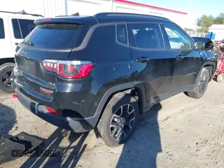 2020 Jeep Compass Trailhawk with VIN 3C4NJDDB4LT220965, listed as a IAAI auction lot 41742194 with 121,704 mi miles and . Bid and sale history available at carsss.com. Image 4.