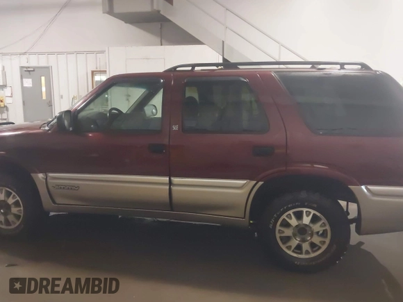 2001 GMC Jimmy SLE with VIN 1GKDT13W712195040, listed as a IAAI auction lot 41710729 with 189,584 mi miles. Bid and sale history available at carsss.com. Image 14.