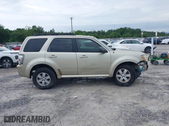 2011 Mercury Mariner z VIN 4M2CN8B72BKJ03915, wystawiony jako IAAI lot #42358251 z przebiegiem 169 206 mil mil oraz . Historia ofert i sprzedaży dostępna na DreamBid. Obrazek 13.
