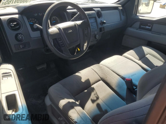 2014 Ford F-150 XL with VIN 1FTMF1CM4EKD33317, listed as a Copart auction lot 50059765 with 188,709 mi miles and Salvage title. Bid and sale history available at DreamBid. Image 8.