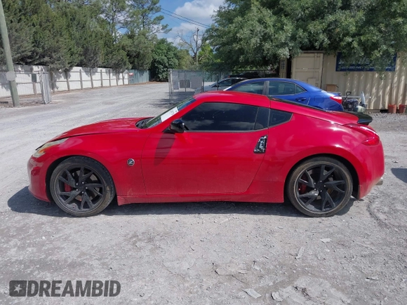 2015 Nissan 370Z Sport with VIN JN1AZ4EH1FM444122, listed as a IAAI auction lot 42140720 with Not Provided miles and . Bid and sale history available at DreamBid. Image 13.