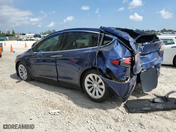 2020 Tesla Model X Long Range with VIN 5YJXCBE27LF297608, listed as a Copart auction lot 42803523 with 0 mi miles. Bid and sale history available at carsss.com. Image 2.