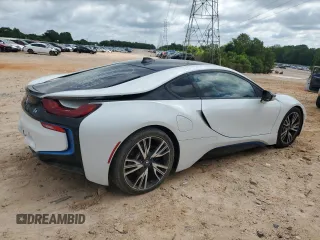 2016 BMW i8 z VIN WBY2Z2C51GV676132, wystawiony jako Copart lot #57046255 z przebiegiem 73 901 mil mil oraz Szkody całkowita. Historia ofert i sprzedaży dostępna na DreamBid. Obrazek 3.