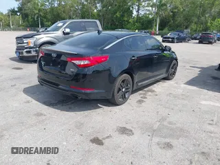 2013 Kia Optima SX with VIN 5XXGR4A61DG100479, listed as a IAAI auction lot 42376261 with 201,615 mi miles and . Bid and sale history available at DreamBid. Image 4.
