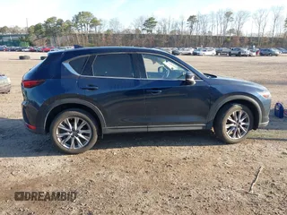 2020 Mazda CX-5 Grand Touring with VIN JM3KFBDM4L0779284, listed as a IAAI auction lot 42060936 with 9,227 mi miles. Bid and sale history available at carsss.com. Image 13.
