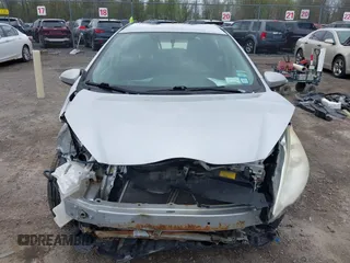 2012 Toyota Prius One z VIN JTDKDTB31C1515979, wystawiony jako IAAI lot #42113818 z przebiegiem 184 528 mil mil oraz . Historia ofert i sprzedaży dostępna na DreamBid. Obrazek 13.