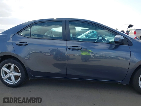 2018 Toyota Corolla L with VIN 5YFBURHEXJP806632, listed as a IAAI auction lot 41933984 with 70,091 mi miles and . Bid and sale history available at DreamBid. Image 14.