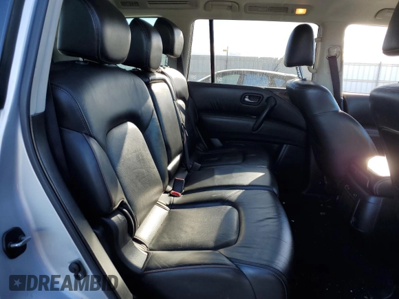 2018 Nissan Armada SL z VIN JN8AY2NC2J9556940, wystawiony jako Copart lot #85341904 z przebiegiem 133 725 mil mil oraz Szkoda całkowita • Salvage title. Historia ofert i sprzedaży dostępna na DreamBid. Obrazek 11.