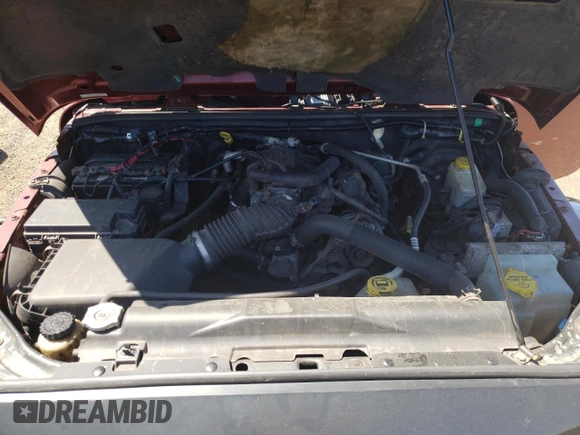 2008 Jeep Wrangler Sahara z VIN 1J4FA54198L505014, wystawiony jako Copart lot #55328045 z przebiegiem 128 049 mil mil oraz Szkoda całkowita • Salvage title. Historia ofert i sprzedaży dostępna na DreamBid. Obrazek 11.