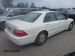 2004 Acura RL w/Navigation System z VIN JH4KA966X4C001584, wystawiony jako IAAI lot #42429042 z przebiegiem 290 258 mil mil oraz . Historia ofert i sprzedaży dostępna na DreamBid. Obrazek 4.