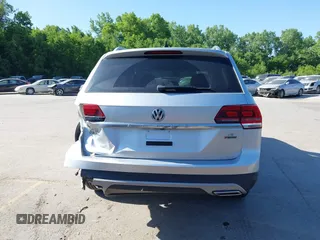 2019 Volkswagen Atlas SE with VIN 1V2UR2CA2KC557449, listed as a IAAI auction lot 42281302 with 106,739 mi miles and . Bid and sale history available at DreamBid. Image 17.