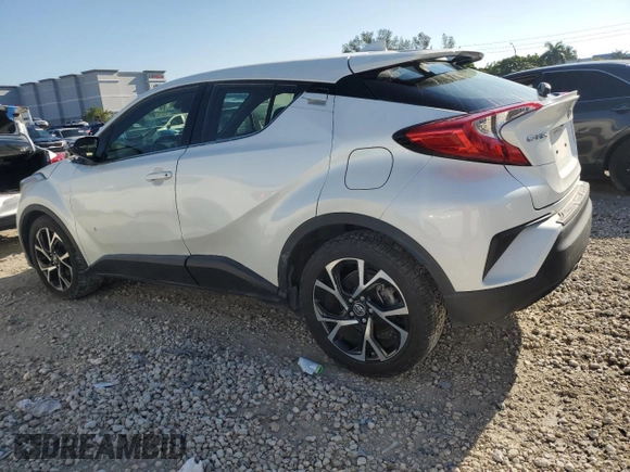 2019 Toyota C-HR XLE z VIN JTNKHMBX7K1014151, wystawiony jako Copart lot #50699475 z przebiegiem 102 995 mil mil oraz Czysty tytuł • Clean title. Historia ofert i sprzedaży dostępna na DreamBid. Obrazek 2.