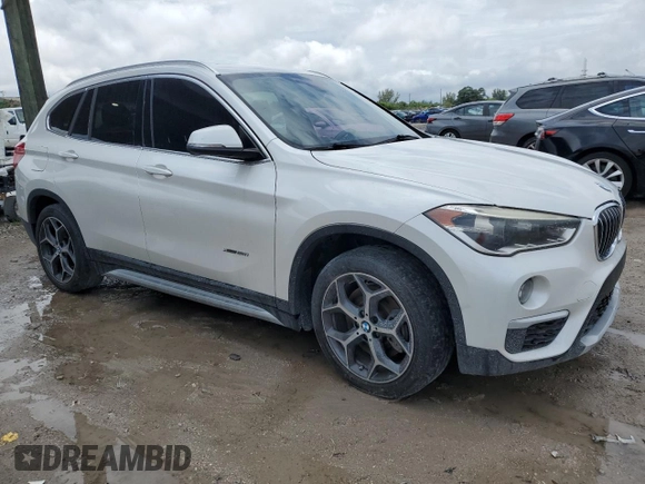 2016 BMW X1 xDrive28i with VIN WBXHT3C34GP887401, listed as a Copart auction lot 52255655 with 129,599 mi miles and Clean Title. Bid and sale history available at carsss.com. Image 4.