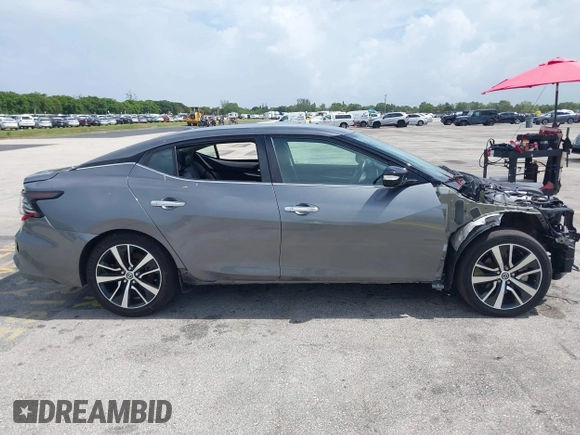 2021 Nissan Maxima SV z VIN 1N4AA6CVXMC508952, wystawiony jako IAAI lot #42491745 z przebiegiem 66 250 mil mil oraz . Historia ofert i sprzedaży dostępna na DreamBid. Obrazek 13.