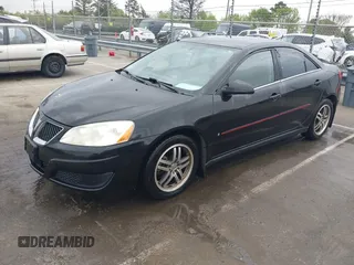2009 Pontiac G6 1SB with VIN 1G2ZJ57B594263412, listed as a IAAI auction lot 41844953 with 234,057 mi miles and . Bid and sale history available at DreamBid. Image 17.