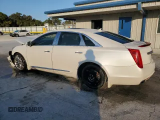 2014 Cadillac XTS Platinum z VIN 2G61W5S84E9153242, wystawiony jako Copart lot #88361685 z przebiegiem 141 401 mil mil oraz Szkoda całkowita • Salvage title. Historia ofert i sprzedaży dostępna na DreamBid. Obrazek 2.