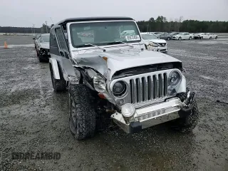 2006 Jeep Wrangler Unlimited LWB with VIN 1J4FA44S36P777065, listed as a Copart auction lot 85972434 with 207,841 mi miles and Salvage Title. Bid and sale history available at carsss.com. Image 10.
