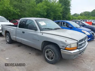 2000 Dodge Dakota z VIN 1B7GL22X7YS781191, wystawiony jako IAAI lot #42498147 z przebiegiem 283 341 mil mil oraz . Historia ofert i sprzedaży dostępna na DreamBid. Obrazek 1.