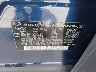 2021 Hyundai Santa Fe SE with VIN 5NMS14AJ2MH339403, listed as a IAAI auction lot 42024896 with 91,734 mi miles and . Bid and sale history available at DreamBid. Image 9.