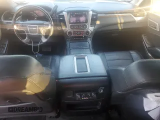 2015 GMC Yukon Denali with VIN 1GKS1CKJ7FR132677, listed as a Copart auction lot 82118584 with 144,798 mi miles and Salvage Title. Bid and sale history available at carsss.com. Image 8.