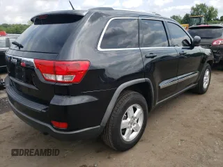 2011 Jeep Grand Cherokee Laredo with VIN 1J4RR4GG9BC515372, listed as a Copart auction lot 64254835 with 212,515 mi miles and Clean title. Bid and sale history available at DreamBid. Image 3.