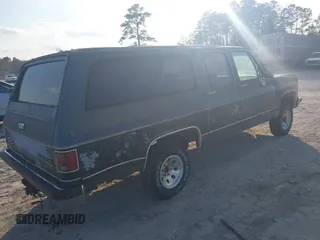 1989 GMC Suburban z VIN 1GKEV16KXKF536870, wystawiony jako IAAI lot #41531645 z przebiegiem 13 976 mil mil oraz . Historia ofert i sprzedaży dostępna na DreamBid. Obrazek 4.