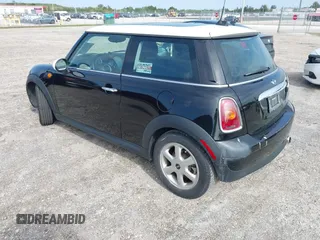 2010 MINI Hardtop with VIN WMWMF3C5XATU77265, listed as a IAAI auction lot 42007797 with 28,856 mi miles and . Bid and sale history available at DreamBid. Image 3.