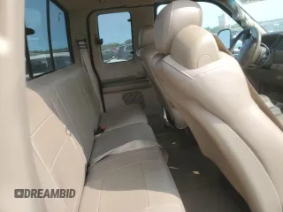2001 Ford F-350 XL with VIN 1FTSX31F11ED72055, listed as a Copart auction lot 66164624 with 228,597 mi miles and Salvage Title. Bid and sale history available at DreamBid. Image 10.