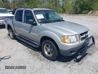 2005 Ford Explorer Sport Trac XLS z VIN 1FMZU67KX5UA59400, wystawiony jako IAAI lot #42051254 z przebiegiem 208 576 mil mil oraz . Historia ofert i sprzedaży dostępna na DreamBid. Obrazek 1.