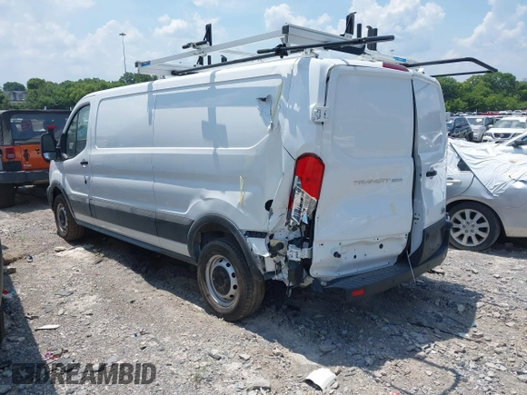 2024 Ford Transit Cargo with VIN 1FTBR1Y89RKA77093, listed as a IAAI auction lot 42556386 with 3,290 mi miles and . Bid and sale history available at DreamBid. Image 3.