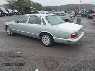 1998 Jaguar XJ with VIN SAJHN1242WC819689, listed as a IAAI auction lot 41148530 with 60,143 mi miles and . Bid and sale history available at DreamBid. Image 3.