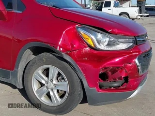 2020 Chevrolet Trax LT with VIN 3GNCJLSB7LL229882, listed as a IAAI auction lot 42005834 with 38,975 mi miles and . Bid and sale history available at DreamBid. Image 6.