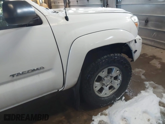 2013 Toyota Tacoma with VIN 3TMLU4EN2DM104490, listed as a IAAI auction lot 41636616 with 153,036 mi miles and . Bid and sale history available at DreamBid. Image 6.