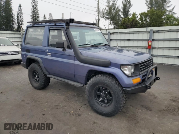 1995 Toyota Land Cruiser z VIN RJ700008084, wystawiony jako Copart lot #42412845 z przebiegiem 115 152 mil mil oraz Szkoda całkowita • Salvage title. Historia ofert i sprzedaży dostępna na DreamBid. Obrazek 4.