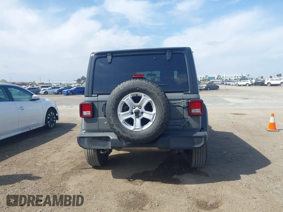 2020 Jeep Wrangler Unlimited Sport S z VIN 1C4HJXDN2LW261730, wystawiony jako IAAI lot #42034942 z przebiegiem 61 465 mil mil oraz . Historia ofert i sprzedaży dostępna na DreamBid. Obrazek 16.